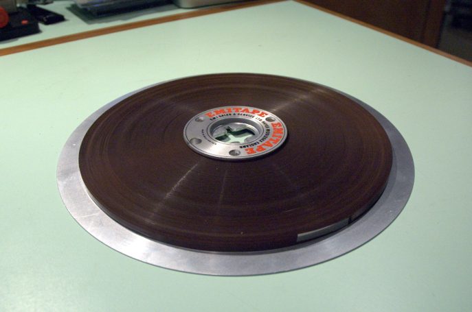 EMI analogue 1/4 inch tape reel. Plays back at 30 inches per second.